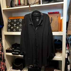 The beautiful sheer top with buttons looks great over sexy bra